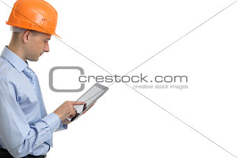 Young construction worker with digital tablet