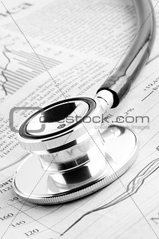 stethoscope on financial chart