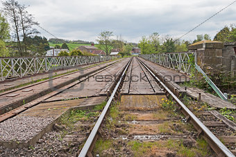 View down railway track in english countryside