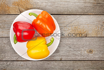 Colorful bell peppers on plate