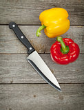 Colorful bell peppers and kitchen knife