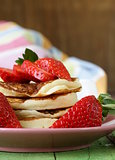 pancakes for breakfast with fresh strawberries