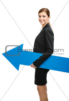 Business woman holding a blue arrow