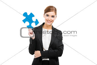 Businesswoman with a puzzle piece