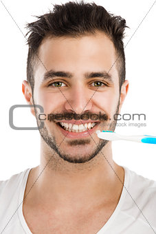 Man brushing the teeth