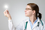 Doctor with glowing light bulb