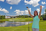 Happy, attractive woman on the golf course