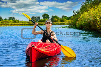 Girl with paddle and kayak 9