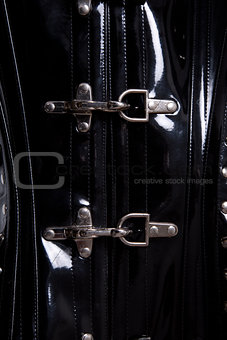 Close-up shot of metal corset clasps 