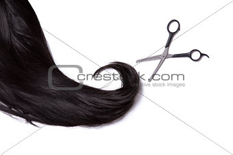 Long black shiny hair with professional scissors 