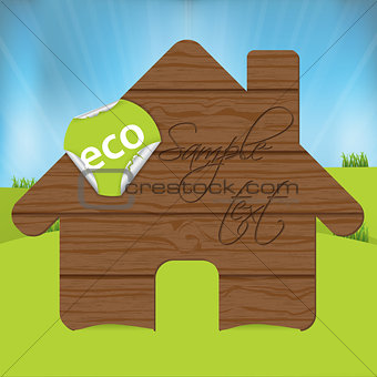 Wooden house sign with eco label
