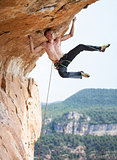 Rock climber on cliff.