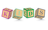 Word KIDS written with alphabet blocks
