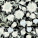 abstract vintage seamless white floral ornament isolated on a bl