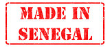 Made in Senegal - inscription on Red Rubber Stamp.