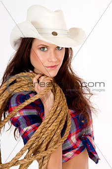 Beautiful Cowgirl Smiles in White Cowboy Hat Holding Rope