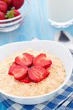 Oatmeal breakfast with strawberries
