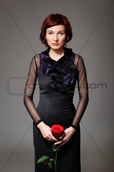 Pretty woman with rose 