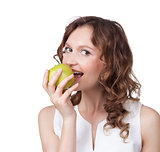 Portrait of fit young girl biting a fresh ripe apple 