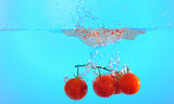 tomatoes thrown in water