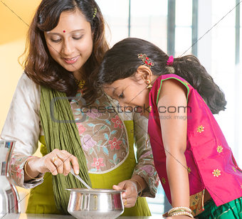Indian family cooking at home.