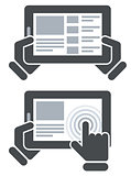 Hands holding tablet computer and open websit