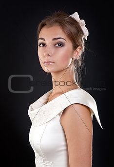 portrait of a girl in a cream dress