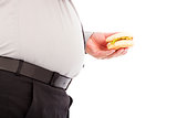 fat business man holding a hamburger fastfood