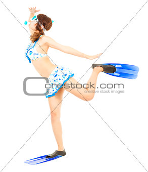 young woman wearing scuba diving equipment and funny pose 