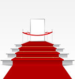 Stairs covered with red carpet 