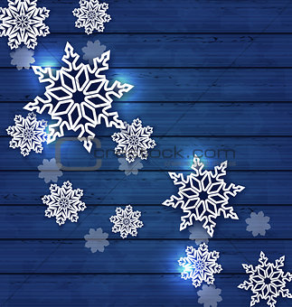 Christmas set snowflakes on wooden background