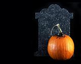 halloween pumpkin and tombstone