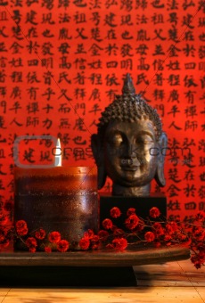 Asian candle with red oriental background