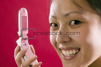 Pretty  Asian woman with cell phone