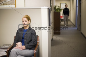 Businesswoman waiting in office lobby
Businesswoman waiting in o