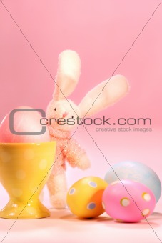 Little rabbit with a colored egg