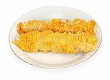 partly eaten corn-cobs