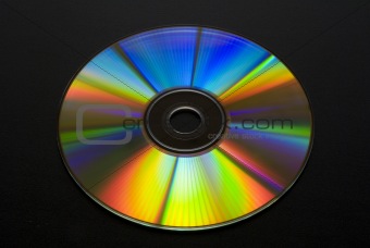 CD or DVD on black