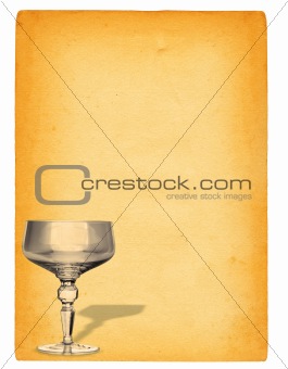 champagne glass against paper