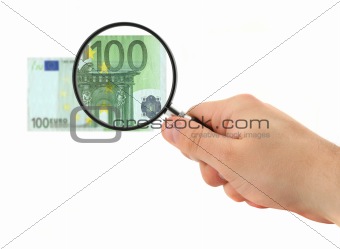 hand magnifying 100 Euro note