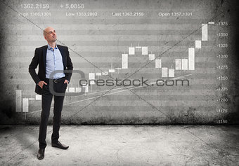 Business man and a growing graph