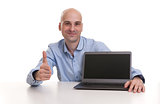 bald Man With Laptop showing his thumb up