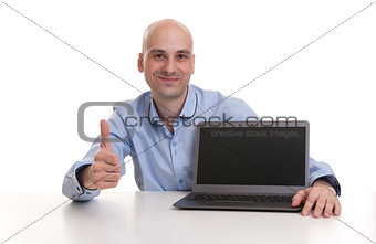bald Man With Laptop showing his thumb up