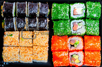 set of different tasty sushi with different fillings
