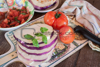 Cooking eggplant with tomatoes