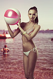 bikini woman with beach ball 