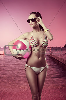 fashion girl with beach ball 