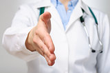 Female doctor offering her handshake