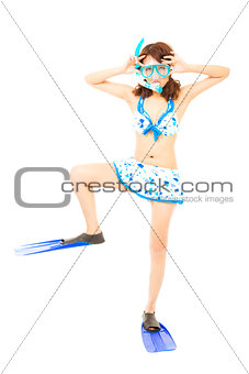 funny young woman make a pose with a scuba equipment
