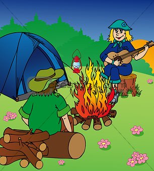 Evening camping by campfire